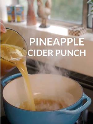 Adding pineapple to your cider is a host with the most move 🤌 This party-ready Pineapple Cider Punch features Dole® Light Pineapple Juice Drink, Dole® Tropical Gold Pineapple Slices, plus all the cozy goodness of traditional apple cider. Here’s how to make it 🍍 1. In a large stockpot, add 1.5 gallons apple cider and 4 cinnamon sticks. Bring to a gentle boil over medium heat. 2. Reduce heat and simmer for 5 min. to infuse cinnamon flavor 3. Stir in 1 (46 oz can) Dole® Light Pineapple Juice Drink, 1 cup honey, 3/4 cup lemon juice, 1 Tbsp lemon zest, and 1 tsp nutmeg 4. Bring back to a gentle boil, then simmer for another 5 min. 5. Discard cinnamon sticks before transferring to serving vessel 6. Pour into a punch bowl or beverage dispenser 7. Float orange slices, 1 (15.25 oz can) #dole #pineapplecider #holidaydrinks 