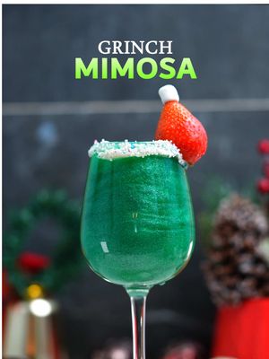 ✨ Comment “BOOK” and get an additional 20% OFF - on top of the already 50% OFF launch pricec for my exclusive 246-recipe Cocktail Book! 📚🍸🔥  🎄💚 The Grinch Mimosa! 💚🎄 A great, delicious cocktail, perfect for your Christmas night! This time I added edible glitter and it looks gorgeous! ✨🥂 🧪 Recipe: • 1 oz Blue Curaçao 💙 • 2 oz orange juice 🍊 • 1 bar spoon edible glitter ✨ • 3 oz champagne 🥂 🍬 Garnish: Rim the glass with vanilla frosting and white sanding sugar. Then add a small upside-down marshmallow topped with a strawberry to create a cute little Christmas hat! 🎅🍓 #ChristmasCocktail #HolidayCheers #ChristmasSpirit #CocktailTime #Mixology