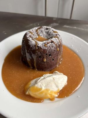 AD I present the perfect winter dessert, the almond chocolate fondant with a miso caramel!    I wanted to level this up using some really high quality ingredients, so I used @Taylor&Colledge International natural almond extract and vanilla pods. You only need a few drops of the almond extract to get an intense and delicious flavour that pairs so well with the chocolate and miso caramel.    Recipe   Chocolate almond fondants with miso caramel sauce and vanilla crème fraîche  Serves 6  Oven 190°C fan. Grease 6 x 180 ml ramekins with butter, dust with cocoa, chill.  Ingredients  Fondants  170 g dark chocolate 70%, chopped  120 g unsalted butter, plus extra for greasing  3 large eggs  3 large egg yolks  120 g caster sugar  40 g plain flour  Pinch fine salt  ½ tsp Taylor & Colledge Natural Almond Extract  Cocoa powder for the ramekins  Miso caramel sauce  150 g caster sugar  3 tbsp water  150 ml double cream, warmed  30 g unsalted butter  1 tsp white miso paste  Pinch fine salt  Vanilla crème fraîche  250 g crème fraîche, cold  1 Taylor & Colledge Organic Vanilla pod - scraped out      Method  Prep the ramekins. Brush with soft butter, dust with cocoa, tap out excess, chill.  Melt the chocolate and butter together in a heatproof bowl set over gently simmering water, or in short microwave bursts. Stir smooth and cool for 2 minutes.  In a mixing bowl whisk the eggs, yolks and caster sugar until pale and thick.  Fold in the melted chocolate mixture.  Sift in the flour and salt and fold just to combine. Stir in the almond extract. Rest the batter 10 minutes to thicken slightly.  Divide the batter between the ramekins, filling each about two thirds. Place the ramekins on a preheated baking tray. Bake for 9 to 10 minutes until the edges are set and the tops look just dry, with a soft centre.  While the fondants bake, make the miso caramel. Put the sugar and water in a small saucepan. Bring to a boil and cook to a deep amber. Take off the heat, slowly whisk in the warm cream, then the butter, miso and a pinch of salt until smooth and glossy. Keep warm. If it thickens on standing, loosen with a splash of hot water or cream.  Make the vanilla crème fraîche. Stir the crème fraîche with the vanilla bean paste and the icing sugar until smooth. Keep chilled.  To serve, rest the fondants for 30 seconds. Loosen the edges with a small knife, invert onto warm plates and lift away the ramekins.  Spoon warm miso caramel around and over each fondant and add a dollop of vanilla crème fraîche. Serve immediately. 