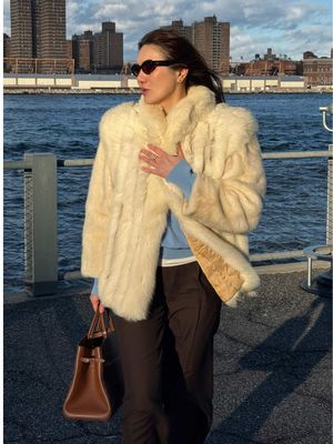 Surviving one of the coldest days so far this fall in my favorite vintage coat from @The RealReal. #OOTD #fall #winter #style #nyc 