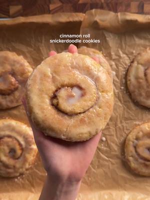 cinnamon roll snickerdoodle cookies cookies: 3 cups + 2 tablespoons (380g) ap flour 3/4 tsp (5g) cream of tartar 1 tsp (6g) baking soda 1/2 tsp (3g) salt 3/4 cup (170g) unsalted butter, soft 1 cup (200g) sugar 2 eggs 1 tsp (4g) vanilla extract 1 tbsp (15g) heavy cream *cream together butter and sugar well. then add in eggs, vanilla, and heavy cream. in another bowl, whisk together the flour, cream of tartar, baking soda, salt. add the wet to the dry and dont overmix. spread into a rectangle and set in the fridge for 10 min.  cinnamon spread: 1 1/2 tbsp (20g) softened butter 3 tbsp (40g) brown sugar 1 tsp (3g) cinnamon 1/2 tsp (2g) cornstarch *mix it all together and the spread of the semi-chilled rectangle dough, leaving an inch at the top. then roll tightly and chill for another 20 min. cut into equal sizes like you would a cinnamon roll, and gently flatten into a puck. roll in cinnamon sugar and then bake at 350 for 11-15 min (time depends on your sizes). glaze: 1/2 cup (60g) powdered sugar 1-2 tbsp water 1/8 tsp vanilla (paste if avail) pinch of salt #cinnamonroll #snickerdoodle #cookies 