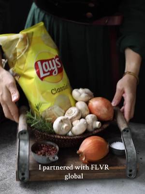 #AD I partnered with @flvr_global to make the most flavorful focaccia: this Caramelized Onion Lay’s Focaccia is topped with caramelized onions, earthy mushrooms, crispy Lay’s, cheese, and fresh rosemary! It is the perfect dish to serve your loved ones at a gathering or on your holiday table. Though it looks impressive and the dough must proof for a few hours, preparing the toppings and baking the focaccia take less than 45 minutes all together! FLVR #partnership #Lays #LaysRecipe Caramelized Onion and Lay’s Focaccia For the Dough: 1 1/2 cups + 2tbsp (358g) warm water 2 1/4 tsp (7g) instant dry yeast ½ tbsp granulated sugar (if you would like more sweetness, add an extra ½ tbsp) 3 tbsp (42g) olive oil 1 1/2 tsp salt 4 cups (520g) flour 1 cup Lay’s classic chips 1 sprig fresh rosemary For the Topping: 8 tbsp olive oil, separated 2 medium yellow onions, julienned 2 tbsp Worcestershire sauce 8 large white mushrooms, thinly sliced 1/4 tsp salt 1/4 ground black pepper 8 cups water 1 cup Lay’s classic chips 1-2 sprigs fresh rosemary 120g fontina cheese, shredded Instructions: Prepare the Dough: In a medium bowl, add 1 cup warm water, yeast, and a pinch of sugar and let rest for 5-7 minutes until fluffy. In a large bowl, add the flour, remaining water, foamed yeast, oil, remaining sugar, and salt and stir until combined. Knead the dough for about 4-5 minutes. The dough will still be sticky and not smooth. Cover the dough with plastic wrap and let it rest for 30 minutes at room temperature. Once rested, add Lay’s chips and the leaves of 1 sprig of rosemary. Gently punch it down to release the air from the dough and and transfer to a lightly floured surface. Carefully knead 5-7 minutes, or until smooth, making sure to keep the chips intact. Transfer the dough to a lightly greased bowl, cover it with plastic wrap and let it rest at room temperature for 10-20 minutes until 20% risen. Then transfer to the fridge and let rest for 2-3 hours, until almost doubled in size. If you’re in a hurry, let rest at room temperature for 45-60 minutes until almost doubled in size. Drizzle a 10”x15” baking pan with olive oil. Then transfer the dough into the pan and gently stretch it to the edges with your hands. The dough will not fully cover the pan at this point. Cover the pan with a clean kitchen towel or plastic wrap and let it rest until doubled in size again, for 50-60 minutes. Meanwhile, Prepare the Toppings: Heat a skillet over high heat. Add 4 tbsp olive oil and the onions and reduce heat to medium high heat. Sauté the onions for 4-6 minutes, stirring consistently. When the onions turn light brown, add the Worcestershire sauce and continue cooking for 2 minutes until they become a deep, caramelized brown. Transfer the onions to a bowl. In the same pan, add two tbsp olive oil and the sliced mushrooms. Add salt and pepper and sauté until golden brown, about 6-8 minutes, then remove from the heat. Bake the Focaccia: Preheat the oven to 450F. Once the focaccia dough has rested, use your fingers and press to make impressions in the bread as in the video.  At this point, the dough should cover the pan fully. Sprinkle 2/3 of the fontina cheese evenly over the top. Spread the caramelized onions evenly all over, and then scatter the mushrooms evenly as well. Then, gently press the rest of the Lay’s on top before covering with remaining cheese. Sprinkle the fresh rosemary leaves and then drizzle four tbsp olive oil and a sprinkle of salt, if desired. Place the pan in the oven and cook for 20-25 minutes until the focaccia is nicely golden brown and the cheese is melted. Remove from the oven, let it cool for 10 minutes, then slice and serve while still warm. Bon appetit