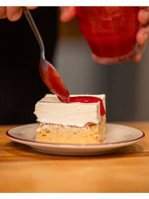 My wife gives me a hard time about the sweets I sneak in late at night... and then always joins me. I understand her concern (makes sense), but cake is the taste of life. I grew up in a home where cake was part of the day, and a little sweet treat waiting in the fridge can truly turn your whole mood around. And this cake? I’m obsessed. Clean layers, perfect corners, bright raspberry jam on top, and I used the new cake flour by @Bob’s Red Mill to get that ultra soft crumb. This Tres Leches is simple, decadent, and can be made ahead for stress free holiday hosting. Full recipe is on my website BenGingi.com YASSS!