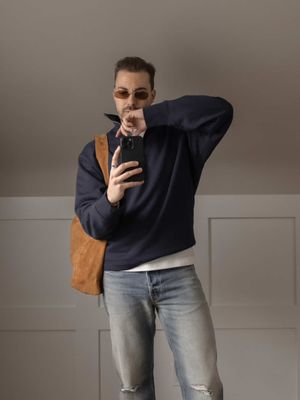 Dressing well as a guy doesn't have to be hard Throw on a quarter zip and a good pair of jeans and you've got a solid fit. #mensfashion #minimal #modern quarter zip. Pullover sweater. Simple outfit idea. Casual winter outfit. Ripped jeans. Men's boots. Men's outfit ideas.
