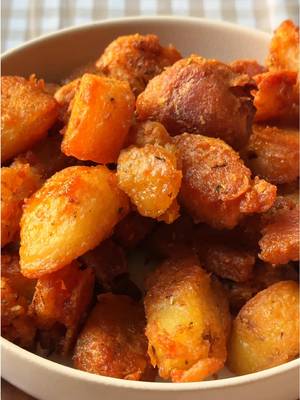 Replying to @ออย ลงรูปไม่ได้ the crunchiest potatoes you’ll ever make!!! this is so much better than a deep fried potato and uses way less oil! ingredients potatoes & boiling: 2.5 lbs russet potatoes, peeled and cut into large chunks water, for boiling 2 tsp chicken bouillon 1/2 tsp baking soda seasonings: 3/4 tsp salt 1/2 tsp black pepper 1/2 tsp garlic powder 1/2 tsp onion powder 1/2 tsp dried thyme 1/2 tsp dried rosemary oil: 1/2 cup avocado oil instructions preheat oven with oil: pour 1/4–1/2 cup avocado oil into a roasting pan or baking sheet. place the pan in the oven and preheat to 400f (200c) for 8–10 minutes until the oil is hot. boil the potatoes: peel the russet potatoes and cut them into large chunks. large chunks are important because when you shake them later, they’ll break slightly and create rough edges for extra crispiness. in a large pot, add 1 tsp chicken bouillon and 1/2 tsp baking soda. add the potato chunks and boil for 8–10 minutes until the edges just start to soften. they should still hold their shape. drain and roughen: drain the potatoes in a colander and shake them gently to roughen the edges. this creates extra crispiness. season the potatoes: in a large bowl, toss the drained potatoes with salt, black pepper, garlic powder, onion powder, thyme, and rosemary until evenly coated. roast: carefully remove the hot pan from the oven. add the seasoned potatoes to the hot oil and spread them in a single layer. roast for about 1 hour, flipping every 15–20 minutes, until golden brown and crunchy. serve: remove from the oven and serve immediately alongside roast meats, gravy, or your favorite meal. tips for extra crispy roasties: don’t overcrowd the pan! give the potatoes space to crisp. shaking the potatoes after boiling roughens the edges for that signature crunch. using baking soda in the boiling water helps break down the potato surface for maximum crispiness. #potato #crispypotato #potatorecipes #ovenpotatoes #EasyRecipe      