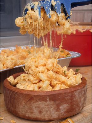 Mac and Cheese over Kingsford Craftsmoke Pellets 🧀🔥   Recipe: -Start by combining these ingredients: A stick of butter 1 lb colby jack 1 lb Monterey Jack 1 block cream cheese 2 cans evaporated milk 1/4 cup hot sauce 1 packet of ranch seasoning -Place on the grill at 375°F for at least 30 minutes. -Once it softens up, blend it to make it smooth, and mix with the noodles. -Layer with more shredded cheese and put it back for 25 more minutes. -Top with green onion and enjoy!