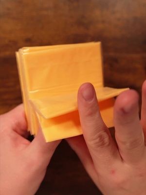 What do you think of these shuffles with cheese? #asmr #cheese #cardistry #thedudewithcards #fup 