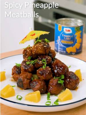 Spice up your holiday party. For the meatballs: 1 lb ground pork ½ cup bread crumbs 1 egg 2 tbsp garlic powder 2 tbsp salt 2 tbsp smoked paprika For the glaze ½ cup Low Sodium Soy Sauce ½ cup Tropical Gold pineapple juice 3 tbsp brown sugar 4 tbsp sriracha 1 tsp ground ginger In a hot pan with a drizzle of high‑heat oil, brown the meatballs. Once browned on all sides, pour the glaze into the pan, cover, turn the heat to very low, and simmer for 10 minutes. Garnish with thinly sliced green onions and toasted sesame seeds, and drizzle with the remaining glaze. #dole #dolepineapple #tropicalgold #spicymeatballs #holidayrecipes 