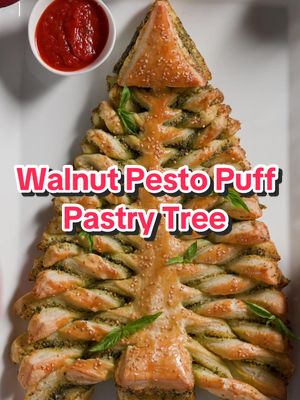 Creamy walnut pesto + puff pastry = instant holiday joy! 🌲✨ @Ivanna Check out the link in bio for the recipe! Sponsored by @CA Walnuts 