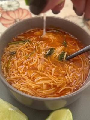 Looking to add a new recipe to your soup rotation? 🍲 Sopa de Fideo is a Mexican staple made with thin noodles and a flavorful tomato broth. Give @daisymayscookingandmore's recipe a try the next time a soup craving hits. Ingredients: - 3 tbsp cooking oil -1/4 of a diced white onion -12 oz cut fideo (or other thin noodle) - 2 c tomato sauce - 2 qts water - 1-2 tbsp Knorr Tomato Bouillon - 1 tsp Pepper - 1 tbsp Garlic Salt - 1 jalapeño (optional) - small bunch of cilantro - salt, to taste - lime Instructions: 1. Heat oil in a large dutch oven or saucepan over medium heat. Add onion, stir and sauté for 1 minute. 3. Add noodles and stir frequently, until it becomes a light brown color (approx 3-5 min). 4. Add tomato sauce and stir to combine. 5. Pour in water and add the tomato bouillon, pepper, garlic salt and stir to combine. Taste the soup and add salt as needed. Bring to a simmer. 6. Add the jalapeño, cilantro. Cover and reduce heat to low and cook for 6 to 8 minutes. Serve with a lime wedge. #Knorr #Fideo #MexicanNoodleSoup #MexicanSoup #MexicanRecipe