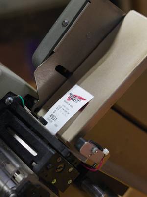 Printing the label for the quarters, one more step in building legacy. #redwing #redwingboots #manufacturing #manufacturingprocess #bootmaking #madeintheusa