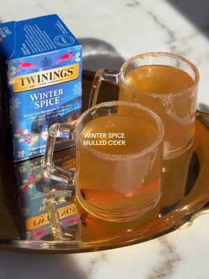 A deliciously warm batched drink perfect for the holiday season 🍎✨ #ad In the colder months, I love sipping on a nice warm beverage and this one is just perfect to enjoy among friends and family 🤗 this batched recipe features a beautiful blend of warm apple cider and @Twinings USA Winter Spice tea 🍎🫖✨ Here’s how to make it: 1. Steep 4 winter spice tea bags in 4 cups of boiling water for 5 minutes. 2. Remove the tea bags and stir in 2 cups of hot apple cider. 3. Add apple slices and cinnamon sticks for that perfect festive touch. 4. Rim your mugs with honey and dip them in cinnamon sugar before adding your winter spice mulled cider. Serve immediately! #twiningsusa #twiningsusapartner #cider #applecider #tea #wintertea #mulledcider #tea #tealovers #batcheddrinks #holidayrecipe #holidayrecipes 