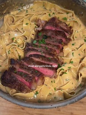 Steak and pasta kinda night 🥩😋 Recipe down below 🫶🏼⬇️ 1.	Boil salted water and cook pasta until al dente. Reserve pasta water. 2.	Season steaks with salt and pepper and sear in olive oil until desired doneness. Add butter, garlic, and herbs to baste. Rest. 3.	In the same pan, sauté onions in butter, add garlic, then deglaze with chicken broth. 4.	Stir in Alta Dena Fresh Whole Milk, lemon zest, and parmesan until creamy. Add pasta water if needed. 5.	Turn off heat, add lemon juice, and toss in pasta. 6.	Top with sliced steak, parsley, and extra parmesan. Enjoy :) #steak #steaknight #steaktok #steakpasta #steakdinner 