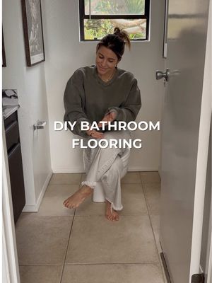 Let’s make this flooring look BETTER! ✨ *I highly recommend them and they are the best quality out of all the samples that I bought! This is such an easy way to change your flooring in your home without 100% committing to a full renovation project! You can do this over tile, hardwood floors or laminate. Make sure to use masking tape if you plan on removing these later on! #Bathroomrenovation #BathroomMakeover #DIYflooring #Peelandsticktile #homerenovation 