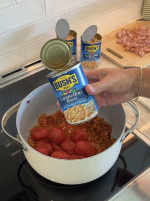 #BushsBeansPartner Creamy Bean and Tomato Soup ⬇️Recipe⬇️  @Bush’s Beans  A cozy, comforting dinner that’s full of flavor and surprisingly easy to pull together. I always keep Bush’s Beans in the pantry because they make it the best – from the first bite to the last.   What you’ll need:  3 tbsp Butter  1 cup Yellow Onion, chopped  5 Garlic Cloves, minced  1 cup Carrots, chopped  1 cup Celery, chopped  6 oz Tomato Paste  2 tbsp Italian Seasoning  4 cups Vegetable Broth  2 15oz cans Bush’s Cannellini Beans  1 15oz can Bush’s Great Northern Beans  1 large can of Whole Peeled Tomatoes   1/2 cup Parmesan, grated  3/4 cup Heavy Cream  4 Kiolbassa Sausage Links, chopped  Melt the butter in a large pot on medium heat. Add onion, carrots, celery and garlic, season with Italian seasoning and cook until onions are translucent, about 8 minutes, stirring occasionally. Add tomato paste, tomatoes, 1 1/2 cans of Bush’s Cannellini Beans, 3 cups of broth. Bring to a simmer and cook for 10 minutes. Pour contents of pot in a blender and puree the soup until smooth. In the large pot, quickly brown sausage. Pour the puree back in the pot with the sausages. Pour in remaining cup of broth and cream more or less depending on desired consistency. Add in remaining cans of beans and stir in Parmesan. Enjoy. 