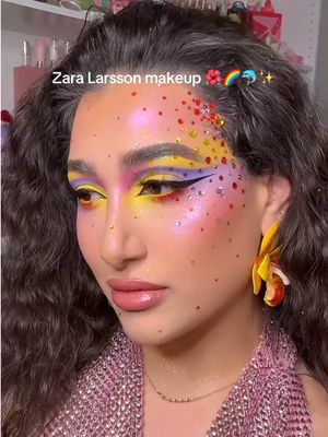 🌺🐬🌈✨ MIDNIGHT SUN✨🌈🐬🌺 You know that I had to hop on the @Zara Larsson effect trend. @sophia sinot you are a visionary genius and thank you for bringing creative makeup back to my fyp. 💖☀️🌅 PRODUCT DETAILS 👉 🌺 BASE  @DanessaMyricksBeauty Yummy Skin Glow Serum  @milkmakeup Hydrogrip Gel Tint  @Haus Labs Concealer  @Rare Beauty Warm Wishes Effortless Bronzer @Beauty Creations Cosmetics Liquid Blush (OK Coral)  @KimChi Chic Beauty Puff Puff Pass Loose Setting Powder *USE CODE “Lexilalamakeup15” FOR 💰 OFF* @Unearthly Cosmetics Spring Magic Incandescent Blush Palette  @bellabeautebar Oracle Chrome Highlighter Palette *USE CODE “Lexilalamakeup” FOR 💰 🐬 BROWS  @NYX Professional Makeup row Glue Crazy Lift  @Benefit Cosmetics Precisely, My Brow Pencil  ✨ GLITTER  @JELLIWINK COSMETICS Loose Pigments (Snow, Rouge, Solana, Imogen, Ultraviolet, Bahama)  🌈 EYES  @ColourPop Cosmetics Fade Into Hue, Matte About Hue Palette, & BFF Crème Liner (Punch) @kimchichicbeauty Holy Sharts Palette *USE CODE “Lexilalamakeup” FOR 💰 OFF*  @Cosmic Beauty Serenity Palette  @EXO Cosmetics Just The Tip Liner  @CITY COLOR COSMETICS Canvas Base (Carousel)  @L’Oréal Paris ionist Mascara  @J-Lash Kawaii Dollz Lashses (Sunshine)  ✨ LIPS  @Morphe Cosmetics Signature Lip Pencil (Wifey) @Half Magic by Donni Davy Crystal Butter Lip Balm (Shell-ebrity) #zaralarssonmakeup #midnightsun #sophiasinot #creativemakeup #zaralarsson 