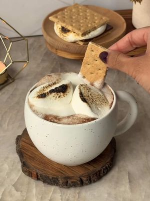 when s’mores meets hot chocolate🍫made extra creamy and dairy-free with @Califia Farms Oat Barista Blend✨ #califiapartner  🍫to a pot, add 1 cup Califia Farms Oat Barista Blend, 2 tbsp dairy-free chocolate chips, and 2 tbsp cocoa powder 🍫whisk everything together over medium low heat until well-combined, then continue simmering for ~5 minutes  🍫turn off the heat and add a splash of vanilla extract  🍫pour into a mug and top with a scoop of dairy-free cream and torched vegan marshmallows 