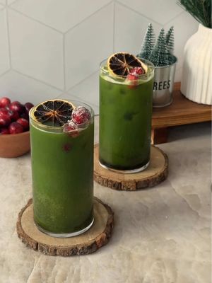 pine matcha tonic🌲🫧something crisp, refreshing, and a little woodsy made with @Torani new Puremade Forest Pine Syrup! the flavor profile combines pine, sage, and ginger, which pairs perfectly with matcha #ad #toraniforestpine #flavoroftheyear  makes 2 servings: 🌲sift 3 tsp matcha powder and whisk with 50ml warm water until smooth and frothy  🌲to each glass, add ice and lemon juice from 1 lemon  🌲pour 1 oz Torani Puremade Forest Pine Syrup into each glass  🌲add 1 cup of sparkling water  🌲pour the matcha evenly into each glass  🌲garnish with a dried lemon slice and sugared cranberries 