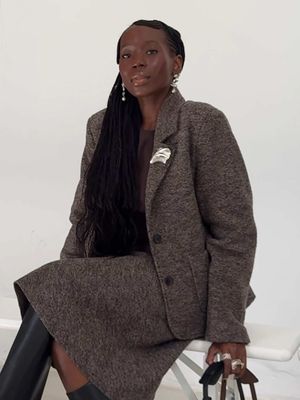 another outfit inspo post, we are getting everything into the light before the NY. Is it just me who gets a wave of motivation at the end of the year? Anyways, I love this outfit; it’s so classic and formal but it really gave me so much nostalgia as it really similar to a suit my mum wore going to work when we were growing up. I love it because when I showed her she was obsessed and immediately asked did you wear it with boots and I said of course, and she smiled. Top moments of the year, living both your mum and your own dreams. The boots are Jimmy Choo, stunning but painful. Jewels, Agmes NYC & Jenny Bird 🦢🤍  #minimalstyle #scandinavianstyle #skallstudio #skall #jimmychoo #braidinspiration #blackhairtiktok 