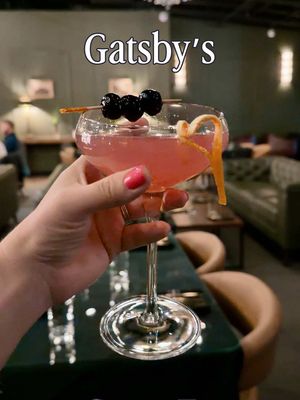 There is a new swanky spot in the Santa Fe Railyard, and it’s perfect for a classy night out.  I went to Gatsby’s Restaurant & Cocktail Lounge for the first time on a Friday night a few weeks ago and immediately loved the vibe. Gatsby’s has a softly-lit speakeasy atmosphere that feels cozy and elevated, and the champagne on entry sets the tone perfectly. Their menu had a great range, and they have an impressive selection of spirits. Their drink menu includes the classics, a list of signature cocktails, wines by the glass, and even a one-hundred-dollar margarita if you are feeling really bougie! A member of their staff gave me a tour, and I got to peek into the private rooms with balcony access that you can rent. They would be perfect for nights when concerts are happening in the Railyard, and you want your own spot with a view. I ordered the Daisy Kiss, and it was precisely the kind of cocktail I love, so I ordered a second one. James had a dirty martini and said it was the best he had ever had. We shared the truffle fries, the street tacos, and an impressively sized and tasty tuna tartare. Every single thing was so so good. Their daily happy hour runs from 4:00 pm to 6:00 pm, with three cocktails discounted to $10 each and 20% off the entire food menu. They have live music on Fridays starting at 6:00 pm, and musicians were setting up as we were heading out, so I want to go back and experience it next time! They also have late hours and a late-night menu offered, which is always exciting! We will definitely be back! #SantaFe #SantaFeRailyard #Gatsbys 