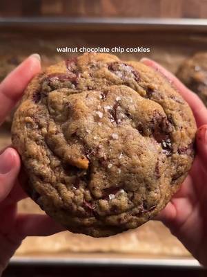 walnut chocolate chip cookies 1 cup (226g) unsalted butter 2 1/2 cups (305g) ap flour 1 tsp (6g) baking soda 1/2 tsp (3g) salt 3/4 cup (150g) brown sugar 4 tbsp (50g) white sugar 2 eggs 2 tsp (8g) vanilla extract 1 1/2 cups (260g) chocolate 1 cup (100g) chopped walnuts *cream together the softened butter and sugars until smooth. then mix in the eggs and vanilla. in another bowl, whisk together the flour, baking soda, and salt. add the dry to the wet and fold gently to mix. fold in the chocolate and walnuts. set in the fridge for at least an hour (i did 3hrs), and then scoop. bake at 350 for about 12-14 min :) #walnut #chocolate #cookies #Recipe 