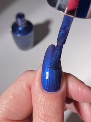 Too-delish-to-miss 💙✨ Sneak-a-Blue Candy is a shimmery blue winter nail polish available exclusively in Infinite Shine.