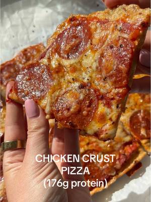 My most viral recipe of 2025 and potentially why you’re here - my Chicken Crust Pizza with 176g of protein for the entire pizza 🍕 All recipes are always on the blog! Link in bio or can search https://basicswithbails.com/ingredients/chicken/chicken-crust-pizza/ This recipe is a protein cheat code!! While also satisfying your pizza cravings 🤤 INGREDIENTS - CHICKEN CRUST 450g ground chicken 2 large eggs 1/2 cup grated parmesan cheese 1 tsp garlic powder 1 tsp italian seasoning 1/2 tsp salt 1/2 tsp black pepper TOPPINGS 1/2 cup pizza sauce 1 cup grated mozarella cheese 20 turkey pepperoni slices DIRECTIONS - 1) Set your oven to 400°F and line a baking sheet with parchment paper. 2) In a large bowl, mix together ground chicken, eggs, parmesan, garlic powder, Italian seasoning, salt, and black pepper until fully combined. 3) Transfer the chicken mixture onto the prepared baking sheet and press it into a thin, even circle or rectangle. You want it thin or else it will have a hard time getting crispy.  4) Pop it in the oven for 25 minutes, or until golden and firm. Let it rest for 5 minutes to set. 5) Crank the oven up to 425°F. Spread on your favorite pizza sauce, cheese, and toppings. 6) Bake for another 10 minutes, until the cheese is melty and bubbly. 7) Let it cool slightly, then dig in and enjoy every crispy, cheesy bite! #highproteindinner #highproteinpizza #proteinpizza #chickenpizza #chickencrustpizza 