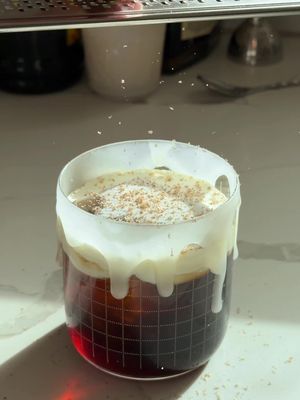 Who wants an Ilya Rozanov White Russian? 🏒 #HeatedRivalry  From the world of Heated Rivalry, this Ilya Rozanov White Russian is smooth, silky, and indulgent — the kind of cocktail that melts slowly, lingers on the lips, and leaves Shane Hollander feeling it long after the glass is empty. Ingredients (per serving): - 2 oz of actually good Russian vodka - 1 oz of coffee liqueur  - 1.5 oz of heavy cream  - grated nutmeg to garnish (optional)  Add the vodka and coffee liqueur into your glass over a single ice cube and stir to combine. Slowly pour the heavy cream on top using a bar spoon, then finish with grated nutmeg. Cheers! *I doubled the ingredients in the video shown* #ilyarozanov #shanehollander #connorstorrie #hudsonwilliams @Heated Rivalry 