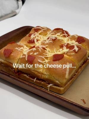 We made Pizza Bread Pull Aparts using our NEW Lewis Bake Shop Brioche Dinner Rolls🥵🍕😍🍞 At this point we were still recipe testing and I think it’s safe to say we needed to bake a little longer 😂  #Fail #CheesePull #LewisBakeShop 