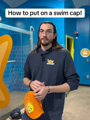 Just like getting tiny toes into boots, or a squirmy toddler buckled in, we know that getting a swim cap on can sometimes be a bit of a challenge. 😅We’ve got you.  #GoldfishSwimSchool #SwimCap #KidsSwimLessons #SwimLessonsForToddlers #ActivitiesForKids 