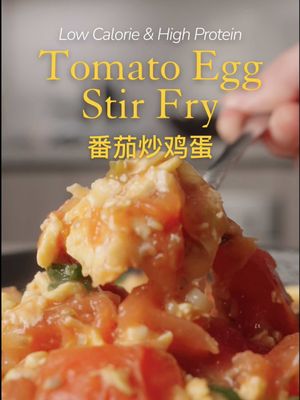 Full Recipe & Macros Below 👇🏻 Tomato Egg Stir-Fry🥚🍅 (2 Servings) Per Serving: ~260 kcal | 18P | 14C | 14F Ingredients • 5 large Eggs (lightly beaten) • 3 medium Tomatoes (cut into wedges)  • 1 tbsp Ketchup • 1-2 tsp Stevia (to taste) • 1-2 tsp Soy Sauce • 1 tbsp Oyster Sauce • 1/4 cup Water • Pinch of MSG • 1½ tsp Cornstarch (mixed with 2 tbsp water) • White parts of Green Onions (sliced, for stir-fry) • Green parts of Green Onions (for garnish) • Neutral oil (for cooking) • Optional: salt to taste Directions 1. Heat a non-stick pan over medium heat with a small amount of Oil. 2. Pour in the beaten eggs and gently scramble until just set but still soft. Remove from the pan and set aside. 3. In the same pan, add a bit more oil if needed and sauté the white parts of the green onions for 15-20 seconds until fragrant. 4. Add tomatoes with water. Cook for 2-3 minutes until softened and slightly jammy. 5. Stir in ketchup, soy sauce, oyster sauce, stevia, and MSG. Mix well. 6. Add the cornstarch slurry and simmer 30-60 seconds until the sauce thickens and coats the tomatoes. 7. Return the eggs to the pan and gently fold everything together until evenly coated. 8. Taste and adjust seasoning if needed. 9. Plate and garnish with green onion tops. Serve hot. —— #asianfood #chinesefood #asianrecipes #highprotein #lowcalorie 
