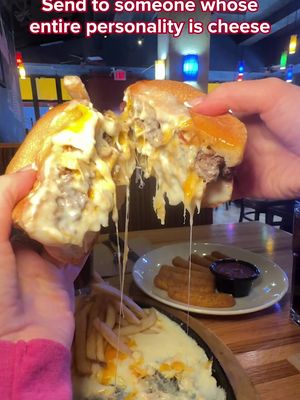 The O-M-Cheese Burger 🤯🤯🤯 is a cheeseburger, served in a sizzling skillet of cheese. Available for just $11.99 – now that’s a deal.
