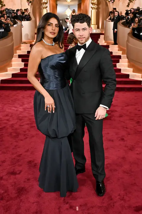 Power couple much! 🔥🤩 Priyanka Chopra & @Nick Jonas on the #GoldenGlobes carpet!  📷: #gettyimages #priyankachopra #nickjonas #redcarpet  