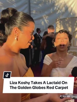 @Drew Afualo has snacks on the red carpet — and Lactaid! #GoldenGlobes #LizaKoshy