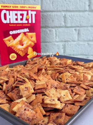 Cheez-It firecrackers are ✨the✨ snack of 2026 Ingredients: 1 (12 oz) box white cheddar cheez-it crackers 1 (12 oz)  box original cheez-it crackers ½ cup canola or vegetable oil 2 (1 oz) packets ranch seasoning ¼ cup red pepper flakes Preheat your oven to 350 degrees F and line a baking sheet with parchment paper or a silicone baking mat. In a large mixing bowl, combine White Cheddar Cheez-It crackers, Original Cheez-It crackers, vegetable oil, ranch seasoning, and red pepper flakes. Mix to coat the crackers evenly. Transfer the crackers to your prepared baking sheet, spread them into an even layer, and bake for 20 minutes, stirring halfway through to ensure they cook evenly. Let the crackers cool completely before storing or enjoying!