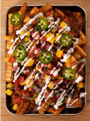 #HORMELChiliPartner Alright now… y’all know I love bold flavor, and @HORMEL®️ Chili No Beans brought it ALL. These plantain fries? Next level and perfect for gameday.  Ingredients 15 oz. Hormel Chili no beans  3 Green plantains  4 Garlic cloves  2 cup Water  2 tsp salt  1 ripe mango, diced small  ¼ cup red onion, finely diced  2 tablespoons fresh cilantro, chopped  ½ jalapeño, diced  2 tomato, diced  Juice of ½ lime  Pinch of salt  Nacho queso cheese 1  Jalapeno, sliced  Sour cream