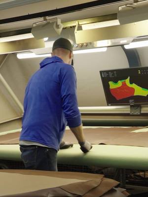 Leather is graded and analyzed for imperfections, ensuring they're avoided when the patterns are cut.