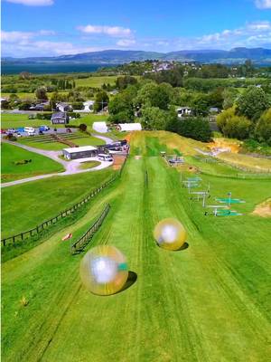 Who would you ride this with?! 🎢 details 👇l 🤗 Send this to your travel buddy! 📍Rotorua New Zealand @ZORB Rotorua | New Zealand  🐹 Did you know you can roll down a massive hill inside a giant inflatable ball in New Zealand?! ZORB is one of New Zealand’s most iconic bucket list experiences. Spinning, bouncing, and laughing your way downhill in a transparent orb. It basically feels like you’re in a hamster ball water slide. 😂 🏷️ Price: We did the “four ride combo” for NZ$155 / US$100 but there are several other packages on their website.  #newzealand #bucketlisttravel #newzealandtrip #adrenalinejunkie #travelnz 