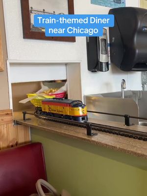A miniature train serves you your food and circles around the entire diner at this Chicagoland spot - perfect for toddlers or any train lovers!