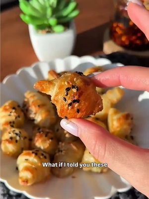 Did I just make mini croissants out of frozen scallion pancake? 🫢🥐  And I fully admit it’s more like 1 PRODUCT, and technically 3 ingredients, ok?? 🤪 Honestly I still can’t believe this worked 😅 These scallion pancake croissant bites were SOOO crispy, poppable, and might disappear in minutes if you’re not looking 👀 The tips + tricks / recipe are in the comments!  All you need are frozen scallion pancakes (you can find them in the frozen section of most Asian supermarkets) [ TIPS ] - defrost the scallion pancake in room temp for about 5 minutes or until it's pliable and able to roll - Peel the top layer of plastic off and keep the bottom plastic layer  - using a paring knife, slice pancake into many small triangles and roll from thick end all the way to the tip - you can brush croissant bites with egg wash and garnish with sesame seeds but it's optional - air fry at 375F for 5 minutes, and 425F for an extra 2-3 minutes (basically until golden brown and super crispy ✨) PRO TIP: drizzle some chili oil for an instant punch of flavour! 🔥  Enjoy!!! #scallionpancake #croissantbites #foodhack