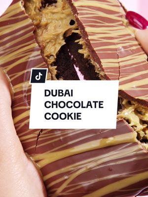 Your new favorite cookie is here! 💚🍫 Say hello to our NEW Dubai Chocolate Cookie. Who are you going to Crumbl with this week? 👀👇 #Crumbl
