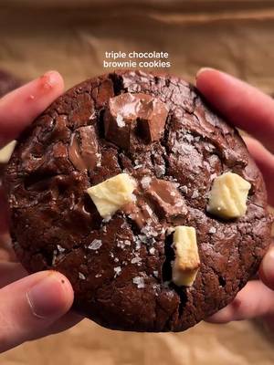 triple chocolate brownie cookies 1 1/3 cups (227g) bittersweet or semisweet chocolate 6 tbsp (85g) unsalted butter 1/3 cup (65g) white sugar 2/3 cup (135g) brown sugar 2 eggs 1 tsp vanilla 3/4 cup (95g) flour 1/4 cup (20-25g) cocoa powder 1 tsp (1g) espresso powder 1/2 tsp (2g) salt 1 cup total chocolate chips (i used 1/3 cup each of white, milk, dark) microwave butter and chocolate in 15-20 second intervals until melted and smooth. in another bowl, beat the eggs and sugar well then slowly add into the choco/butter mixture. mix in the vanilla. in another bowl, whisk the flour, cocoa powder, salt, and espresso powder. gently fold in the dry to the wet. bake at 350 for about 10-12 min or until the tops are nicely crackled. optional: top with flakey salt! #chocolate #brownie #cookies 