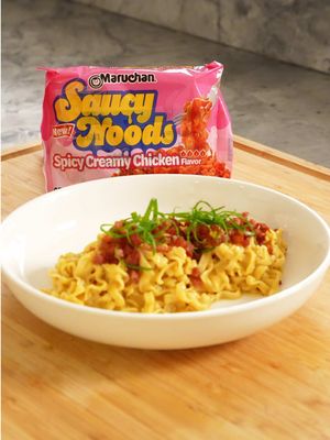 Lemme see you recreate this dish for V Day! Get Maruchan Saucy Noods on TikTok Shop, Amazon and at select retailers. Minute Maruchan Creamy Chicken Carbonara: - 2 packs Maruchan Saucy Noods Spicy Creamy Chicken - 3 large egg yolks - ½ cup (45 g) finely grated Parmesan cheese, plus more for finishing - 3 oz (85 g) guanciale or pancetta, small dice - ¾ tsp freshly ground black pepper, plus more to taste - ½ tsp lemon zest (very light) - 1 tsp chili oil (light use) - 2 tbsp thinly sliced green curly scallions - ½ - 1 cup reserved noodle cooking water (you may not use all) - Salt, only if needed * Add separated yolks to a bowl and whisk. Add parmesan, salt and pepper and combine. * Cook Maruchan noods and reserve noodle in water. * While the noods are cooking, cook pancetta over medium high heat for 5 minutes. * Set aside the crisp pancetta and toss noodles in the leftover fat. Add yolk and cheese mixture and a dash of the Maruchan spicy creamy chicken packet, and chili oil. Stir vigorously until the sauce thickens. * Transfer to a bowl and top with pancetta and curly scallions. Enjoy. #BiteMe #Maruchan #Ramen #Ad 
