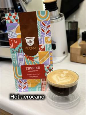Hot aerocano, the creamy americano, the perfect recipie to practice latte art if you don’t drink milk 😉☕️👌🏼 Recipe and steps (for a 200 ml glass/cup):  • Split your shot in half (I am using the double spout portafilter that comes with the espresso machine, which with a good puck prep, accurately splits the shot in equal parts).  • Add ~75 g ice cubes in the latte art pitcher.  • Add the half espresso shot (18g in my case).  • Add room temperature water until reaching a total weight of 160g in your pitcher.  • Steam as you usually do for milk, but add a few more seconds to your air injection stage, and stop steaming at around 55°F/131°F (my machine automatically stops at the IR detected temp).  • Tap, swirl and pour as soon as possible because big bubbles will form faster than with milk. Note that complex latte art (swans, winged tulips…) will be trickier, I have not been able to get those without milk, but you can still practice and make beautiful simple tulips! 💪🏼 I am using the Espresso blend from @buunnicoffee with clear bright notes that I love in coffee, resulting in a deliciously balanced cup, and becoming tastier (in my tasting opinion) from a regular darker roast espresso blend. Coffee equipments/tools:   • Espresso machine (grinding by weight, brewing with pressure profiling, IR steaming): La Seine X from @maxims_espresso_official    • Gravity distributor and sharp spout 450 ml latte art pitcher from @normcore    • Impact tamper from @Ikapecoffee   • Balance Pro scale from @Cocinare Direct    • 200 ml double wall glass from @kruveinc  You can find links and/or discounts to some of my  coffee gear through the link in my Instagram bio! #coffee #cafe #coffeetime #fyp #foryoupage 
