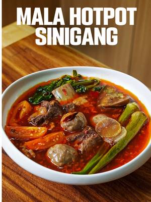 Mala Sinigang 🌶️🥣 At first glance, you wouldn’t even guess this is sinigang. The aroma is all mala. Bold, spicy, and numbing. But once you take a spoonful, the sourness comes through right away. Rich, tangy, and deeply layered. I kept the broth clean and didn’t add milk like you would in a typical malatang hot pot, so the sinigang stays front and center. And cooking all the veggies down hot pot–style just made sense. Sinigang already has so many components, and every bite ends up a little different. It’s spicy, around a 6–7 out of 10, but really enjoyable. Definitely not your usual sinigang, but worth trying if you’re feeling creative. Tag someone who loves spicy food 🔥
