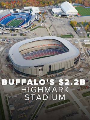 Standing at Buffalo’s Family Circle plaza in the snow, you can see the Bills’ past and future in one view ❄️🏟️   Across the street: the $22M Highmark Stadium built in 1973, bare bones and exposed to the elements.   Right beside it: the new $2.2B Highmark Stadium taking shape, built for the weather with a canopy, heated field, climate-controlled spaces, and premium experiences. 🎥: @Tyler Webb 