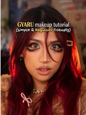 EASY BEGINNER GYARU MAKEUP TUTORIAL FOR WARM TONED ASIAN SKIN 💗🌸⭐️✨ aka HOW TO DO GYARU MAKEUP FOR BEGINNERS hi everyone!! thank u soo much for the love on my recent gyaru look~ it was my first time doing this look so to receive yalls support really means a LOT. i truly have always loooveddd what gyaru has stood for — going against traditional beauty standards, self expression, and confidence 🥹 i’m veryy happy that gyaru is making a comeback (if u will) in mainstream media lately, ITS ABOUT TIME ‼️ so use this tutorial to learn all about the fundamental basics to building a gyaru makeup look, specifically how to do the eyeliner, skin prep, and contour.  not wanting to make the video too long, i’m making a note here that because this look is so matte and does use a lot of powder, make sure that your skin is adequately hydrated and primed before beginning the look! i like to use @medicube global hydrating facepads when my skin really needs it, but avoid using moisturizers that have too much oil or are too thick as this will be very cakey on the skin and hard to work with!  let me know what you think of this look or if you have any questions at all! thanks again for your support 🌸⭐️💗💫 —— products used:  @Anastasia Beverly Hills modern renaissance palette <3  @Parnell US cicamanu cushion foundation in 24N @Maybelline New York grippy primer  @Urban Decay Cosmetics matte setting powder (mine is on its last legs LOL) @NYX Professional Makeup bare with me concealer in ‘vanilla medium’ @Revlon Cosmetics colorstay micro eyeliner in “301 blackout” sweater is from @peilieeshop 🦌 gyaru makeup tutorial, beginner gyaru makeup, beginner makeup tutorial, gyaru transformation, gyaru makeup, caracakez makeup tutorial, caracakez, easy makeup tutorial, gal, gal is mind, beginner tutorial gyaru, gyaru style, warm tone skin makeup, warm toned skin tutorial, asian warm toned skin, asian skin makeup, agejo gyaru, gyaru contour, gyaru eyeliner, gyaru eye makeup, gyaru base makeup #gyaru #gyarumakeup #gyarustyle #beginnermakeup #gal 