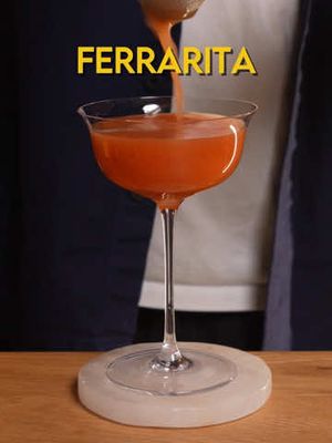 Ferrarita Fernet Branca, Campari, Orange Liqueur, Lime You’ve heard of the jagerita… now meet the ferrarita. I love Ferraris. Half fernet, half Campari, and the sum of both amaro creates a delicious and delightfully bitter shot. Plug that into the jagerita format and you get an equal parts cocktail that's somewhere between a Love and Murder and Industry Sour. .75 oz Fernet Branca .75 oz Campari .75 orange liqueur .75 oz lime juice Shaken, double strained into a couple glass, garnished with a lime coin. #cocktails #drinks #mixology #fyp 
