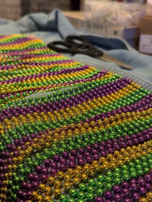 Bringing back my DIY upcycled denim bead jacket just in time for Mardi Gras! 💛💚💜 If you make your own tag me! 🫶🏼✨ #mardigras #mardigrasdiy #mardigrasjacket #beadjacket 