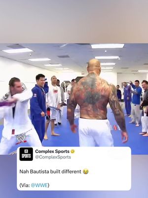 Throwback to Bautista walking the ceremonial gauntlet after earning his purple belt in Brazilian jiu-jitsu 😭 (Via: @WWE )